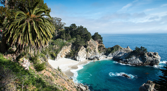 McWay Falls is an 80-foot waterfall located in Julia Pfeiffer Burns State Park that flows year-round. This waterfall is one of only two in the region that are close enough to the ocean to be referred to as 