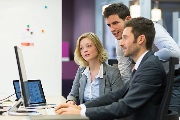 istock Group of business people in a meeting, working on computer 536856571