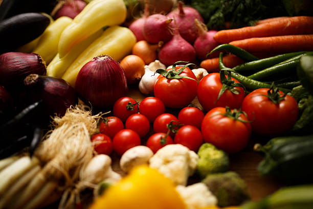 Healthy Organic Vegetables on a Wooden Background