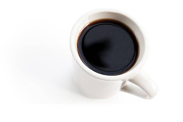 istock White cup full of black coffee stands on the table 536875419