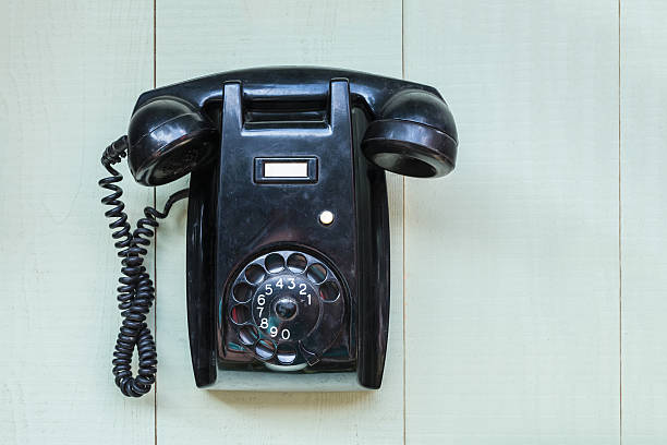 istock Vintage black wall telephone 536875787