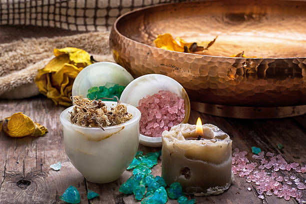 istock bronze bowl with water and accessories spa treatments 536876057