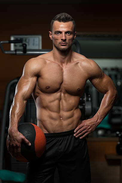 istock Athletic Man Workout With Medical Ball 536876279