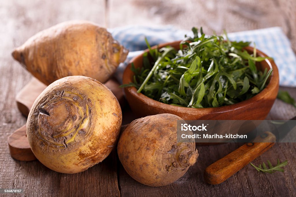 Swede Fresh swede on wooden desk Rutabaga Stock Photo