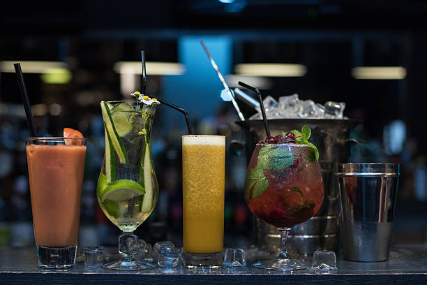istock cocktails on bar background 536885702