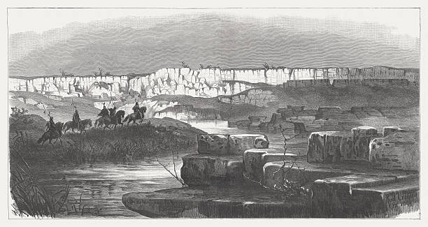 Pipestone National Monument, Minnesota, USA. This monument preserves traditional catlinite quarries used to make ceremonial peace pipes, vitally important to traditional Plains Indian culture. The quarries are sacred to the Sioux and Lakota people and were neutral territory where all tribes could quarry the stone. Woodcut engraving after a sepia drawing (1881) by Rudolf Cronau (German painter, 1855 - 1939) from the book 