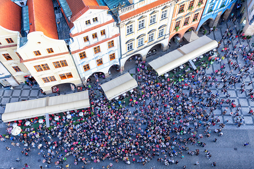 crowd of tourists and Prague residents in front of the Old Town City Hall, Old Town Square, Prague, Czech Republic