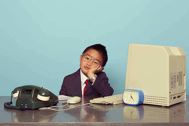Young Japanese Boy Tired at the Office