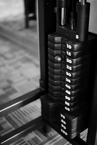 Stack of weights on a healthclub workout machine.
