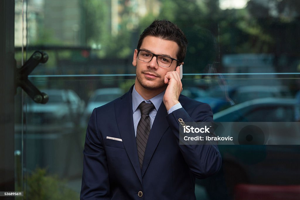 Young Businessman On The Phone Young Businessman Talking On The Phone 2015 Stock Photo