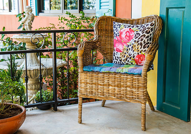 istock Wicker chairs stand in front of the house. 536896567