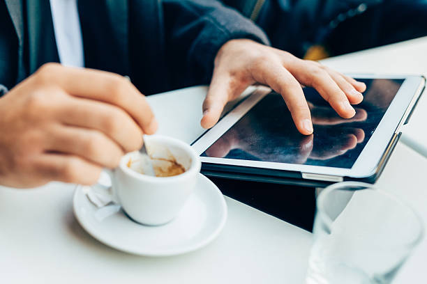 istock Close up on the hands of young businessman using tablet 536903156