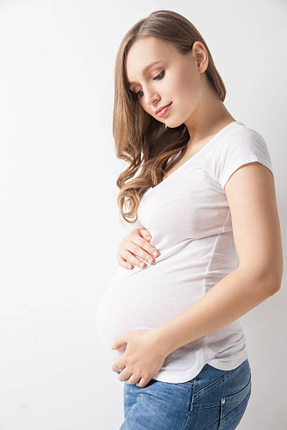 istock Beautiful woman expecting baby 536906034
