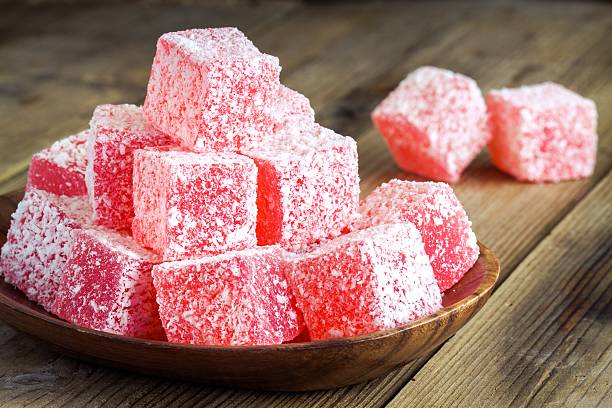 istock Red Turkish Delight in a wooden bowl closeup 536917497