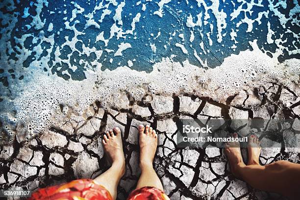 Feet Standing On The Beach Stock Photo - Download Image Now - 2015, Activity, Adult
