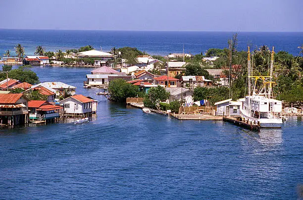 Oakridge town built along Water with many houses built over water on the East End of Roatan in the Bay Islands Honduras