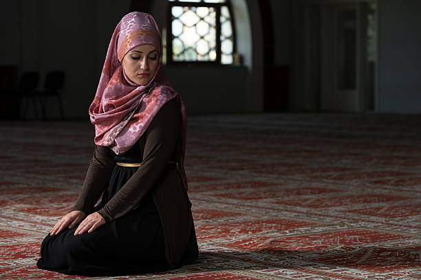 istock Young Muslim Woman Praying In Mosque 536920853