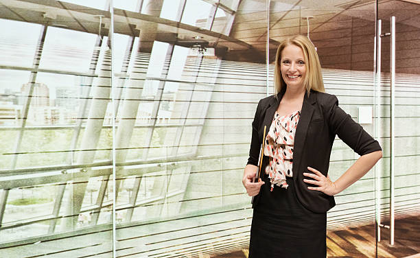 istock Businesswoman standing in office 536921169