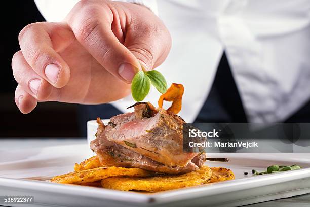 Chef In Hotel Or Restaurant Kitchen Cooking Only Hands Stock Photo - Download Image Now