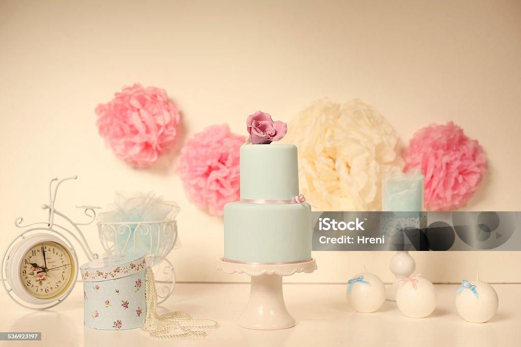 blue marzipan cake cake, wed, wedding, white, flower, pink, catering, light, decorate, birthday, decoration, icing, bouquet, cream, marzipan, photography, isolated, ceremony, nobody, rose, dessert, sweet, unhealthy, decker, shot, reception, marriage, celebrate, studio, ivory, celebration, married, event, frosty, vertical, arrangement, tasty, bakery, colors, rings, confectionery, pastry, beautiful, romance, party, nutrition, lily, eating; 2015 Stock Photo