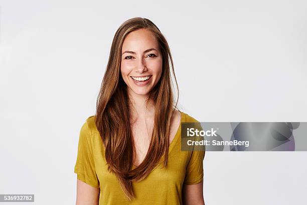 Brilliant Smile On Beautiful Brunette Portrait Stock Photo - Download Image Now - One Woman Only, Smiling, White Background