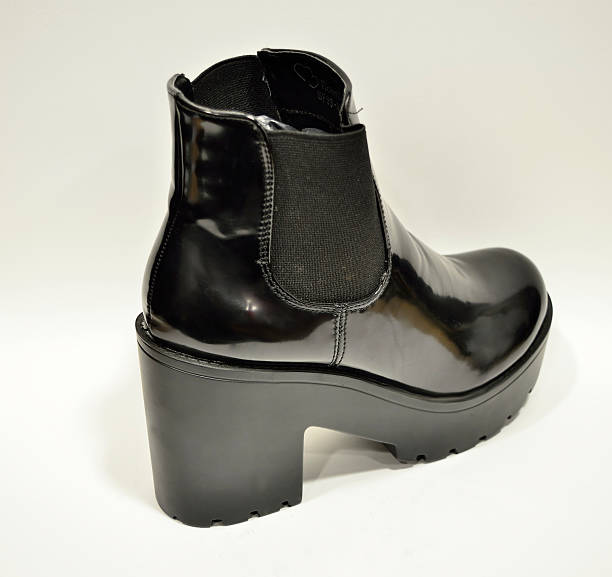 istock woman black shoe 536950311