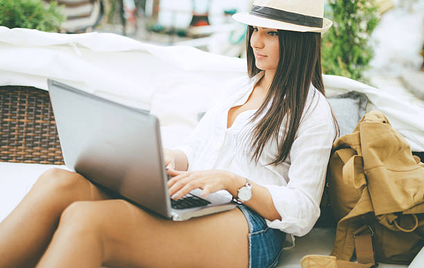 istock young woman working on her laptop 536950950