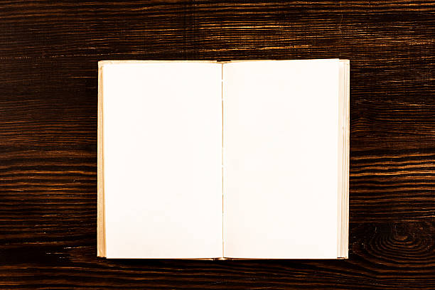 istock Open Book On Wooden Desk. 536951065