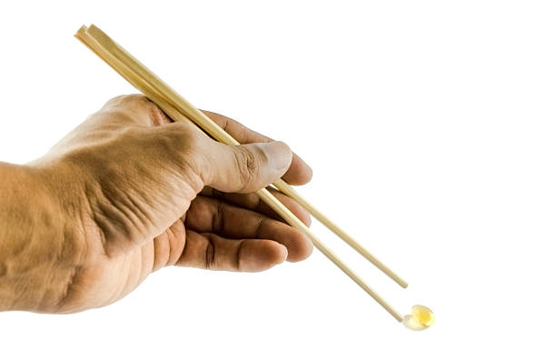 istock Chop stick picking a fish oil 536953277