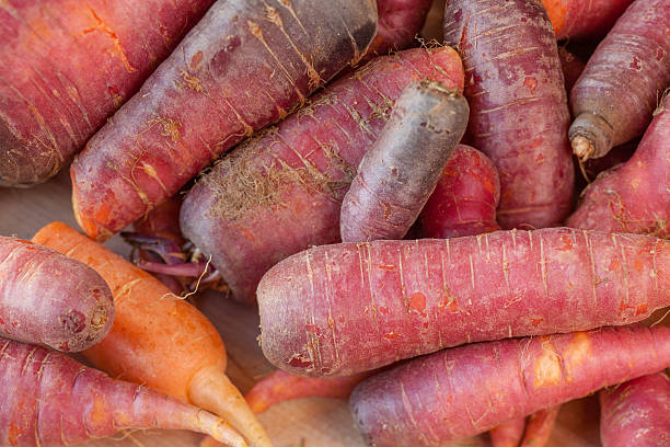 istock Fresh organic red carrots on wood table 536958614