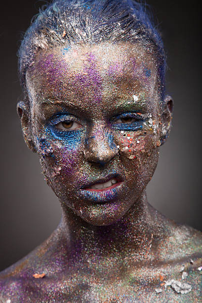 istock Portrait of woman with unusual solver paint make-up 536972565