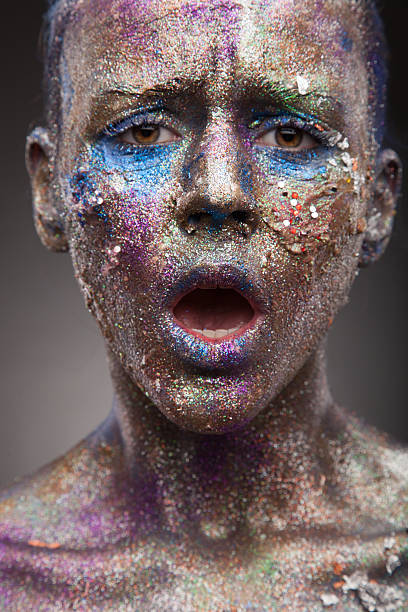 istock Portrait of woman with unusual solver paint make-up 536972575
