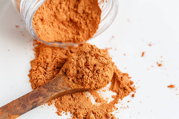 Goji Berries powder Goji Berries powder on wooden spoon superfruit stock pictures, royalty-free photos & images