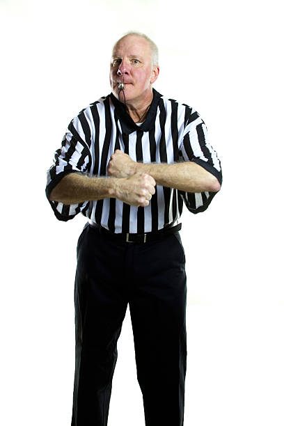 Traveling Basketball referee signaling a Traveling foul foul stock pictures, royalty-free photos & images