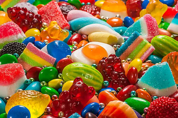 A close up landscape of colorful candy of many varieties.