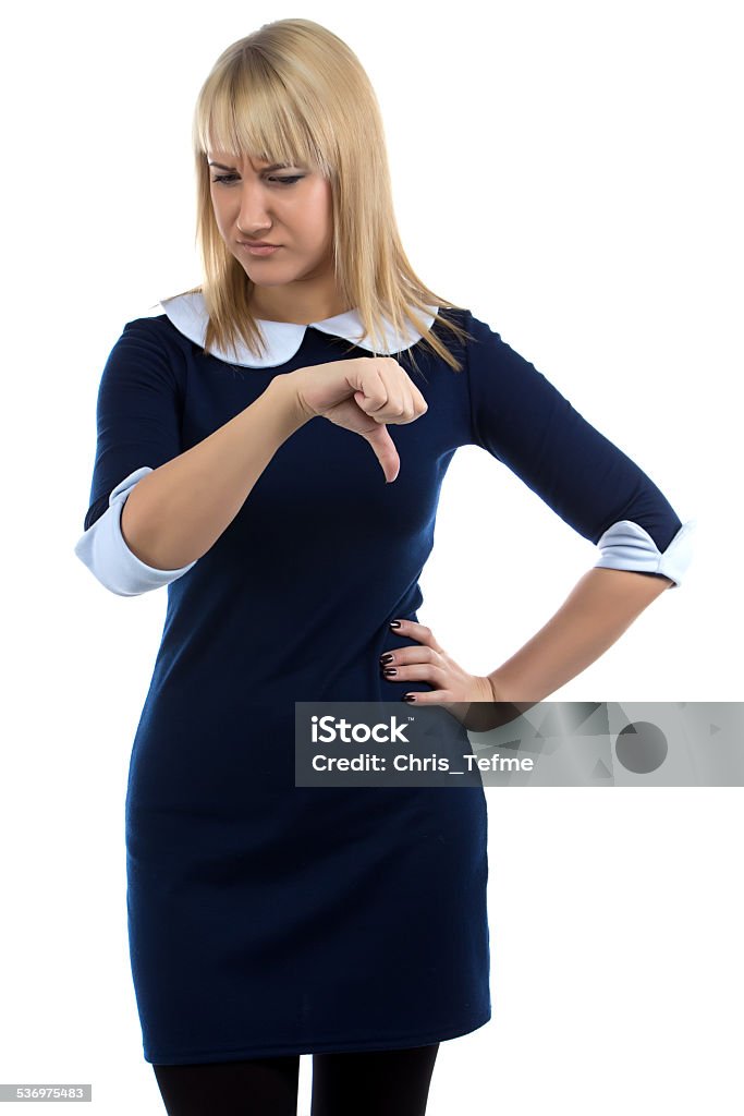 Image of woman with thumbs down Image of woman with thumbs down on white background 2015 Stock Photo