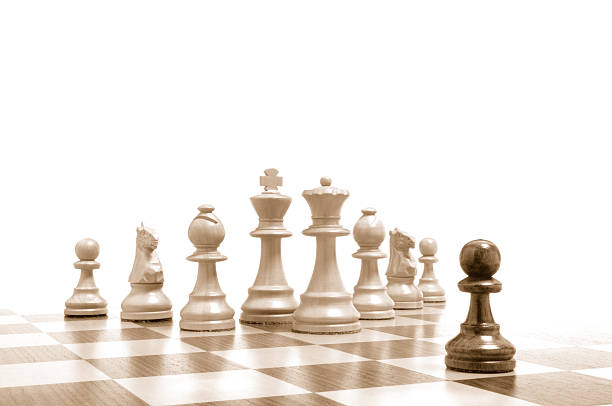 istock One against all - All against one - Chess pieces 4 536975673