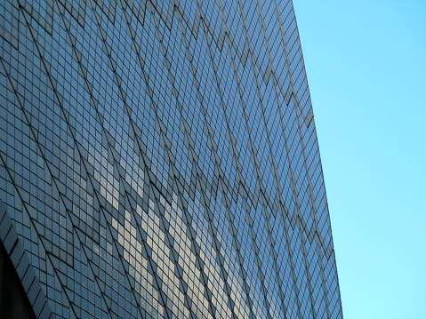 Architecture abstract background, close-up shot of office building windows