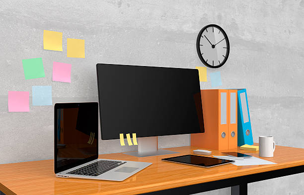 istock Smart phone, laptop and coffee cup on wood table 536977699