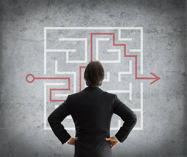 istock strategy for success - businessman solve maze 536977961
