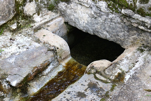 It is a natural pure mineral water spring, which comes directly from the mountain without first passing through any town or city. 