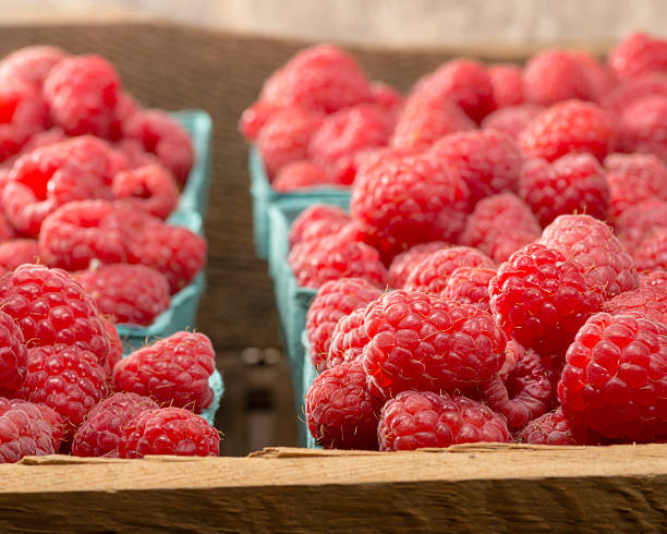 istock Fresh red raspberries on display at the market 537014541