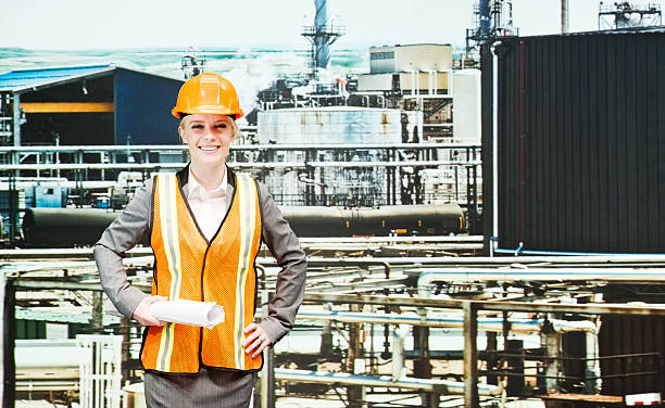 istock Smiling female architect at the refinery 537014581