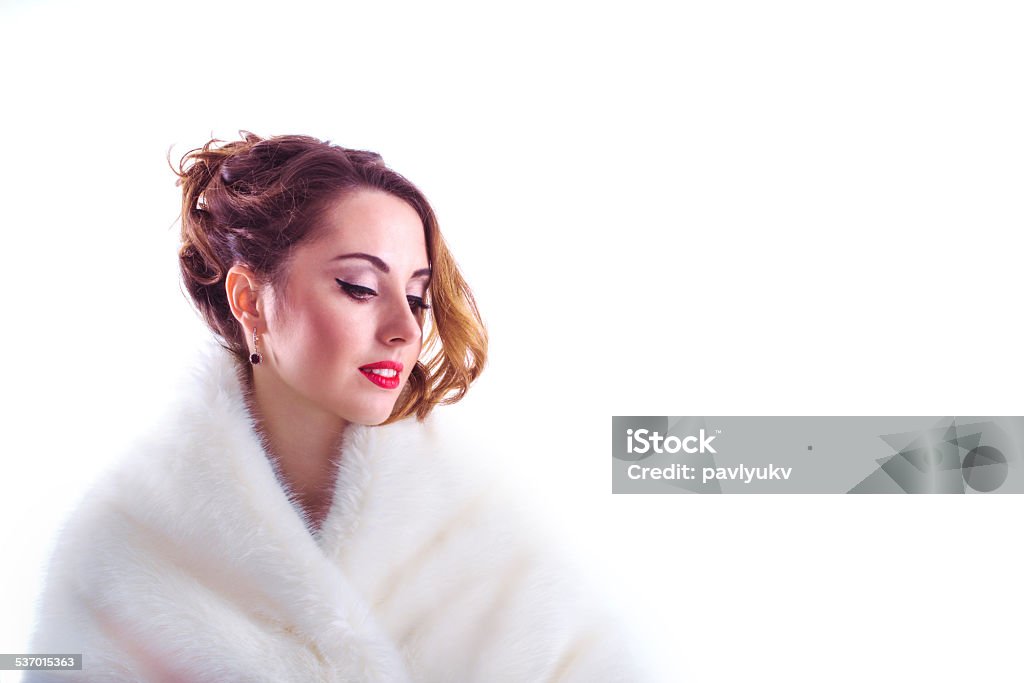 Woman in fur coat Woman in fur coat isolated on a white background 2015 Stock Photo