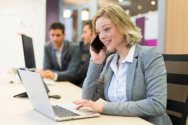 istock Businesswoman talking on the mobile phone in modern office 537019947