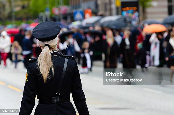 Policewoman At Parade In Bergen Norway On Constituition Day Stock Photo - Download Image Now