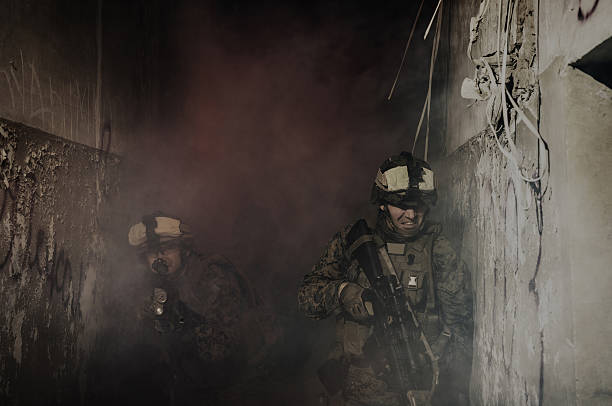 istock Anti-terrorist operation. Soldiers going up in smoke 537043113