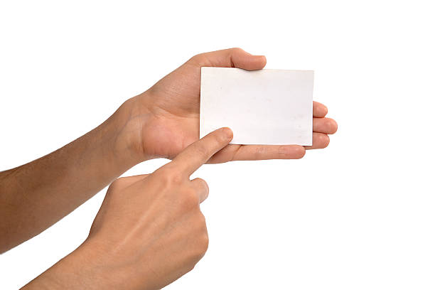 istock Female hand holding a businesscard 537044863