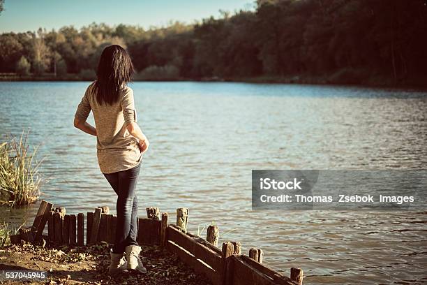 Girl On The Pier Stock Photo - Download Image Now - 2015, Adult, Adults Only