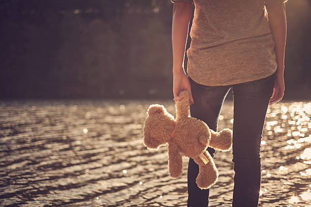 istock Teddy bear and pretty girl 537045949